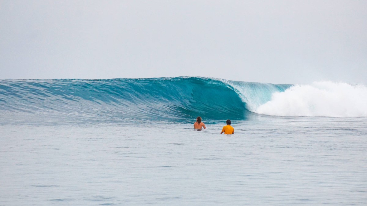 At Awera Resort are available professional surf videography package for our guests Our two surfer guests are photographed while waiting in the water for the right wave