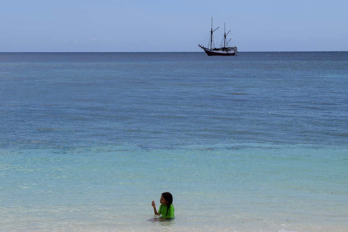 Liveaboard and guest child in Forgotten Islands