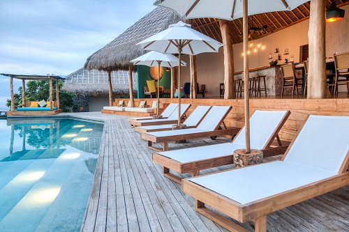Pool deck and bar at Savu South Alor Resort