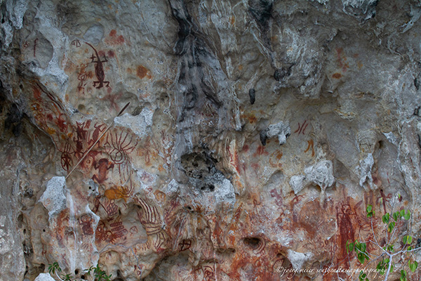 Ancient rock art excursion at Triton Bay Divers resort in Indonesia