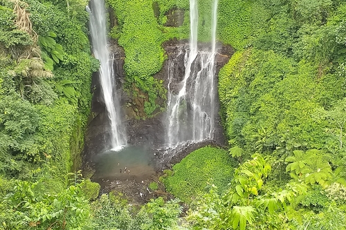 Grombong waterfalls immersed in Bali jungle