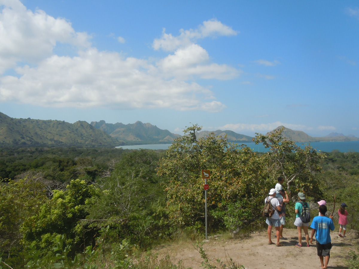 Family with kids in trekking at Komodo National Park