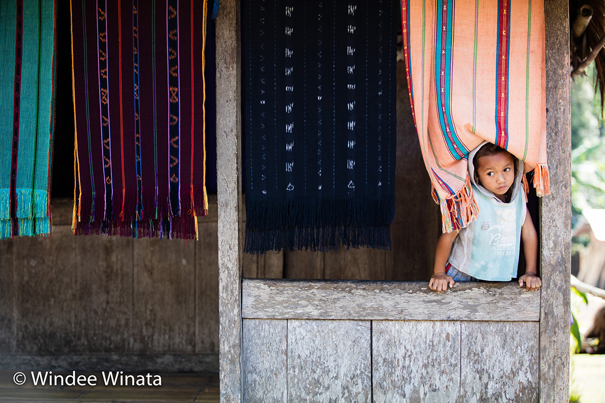 Kid of Flores Island and ikat
